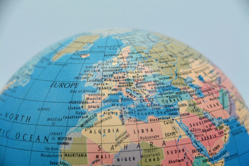 A close-up of a globe showcasing Europe, North Africa, and surrounding seas.